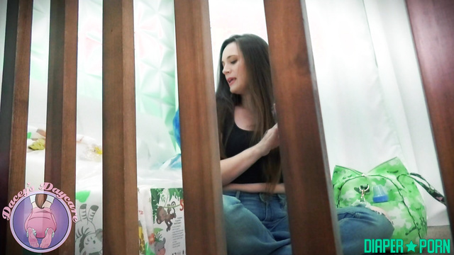 Black-haired Dacey drooling over bottle in nappy - Dacey's Daycare