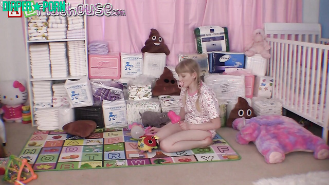 Blonde Krystal's pigtails bouncing in messy play - AB Playhouse