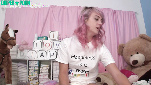 Andi swapping diaper solo, playful talking - DiaperMess