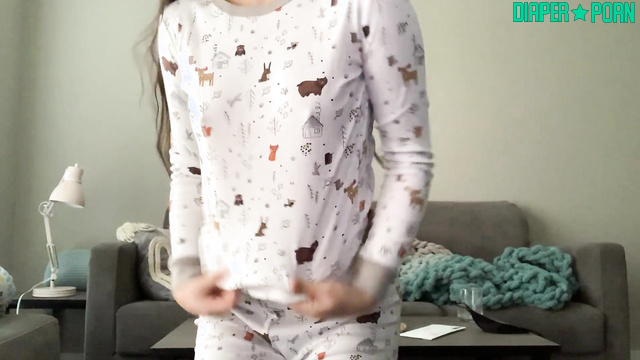 Topless brunette Lainey pissing and moaning in bed - ABDL Porn