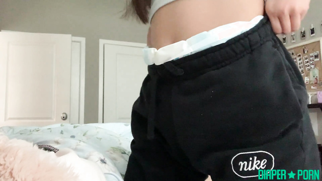 Brunette Lainey pissing hard in diaper, loves the mess - ABDL Porn