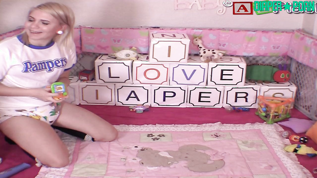 Blonde crying as diaper is pinned tight - AB Playhouse