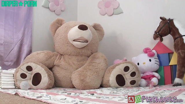 Nikki squatting wide in messy diaper play - AB Playhouse