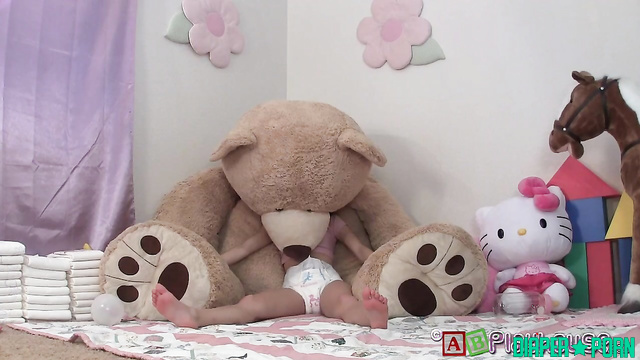 Nikki squatting wide in messy diaper play - AB Playhouse