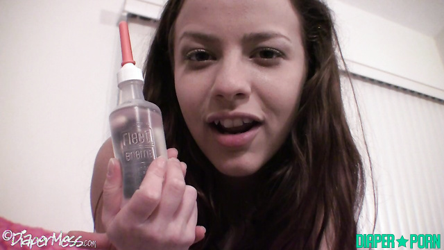 Nude brunette in dirty diaper, moaning through enema - DiaperMess