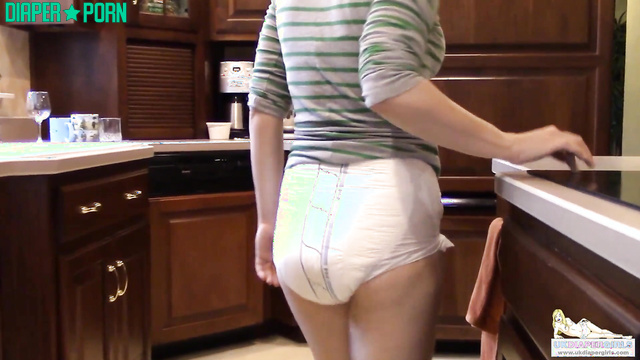 Brunette solo naughtiness in soggy diaper - UKDiaperGirls