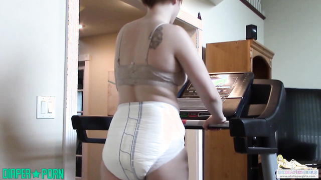 Brunette athlete grinding hard in soaked diaper - UKDiaperGirls