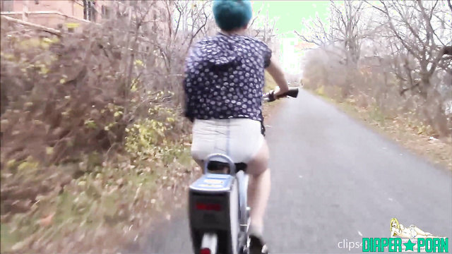 Multicolored hair babe solo in soggy nappy tease - UKDiaperGirls