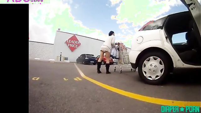 Brunette Virginie in public, diaper bulging - UKDiaperGirls