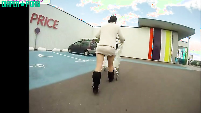 Brunette Virginie in public, diaper bulging - UKDiaperGirls