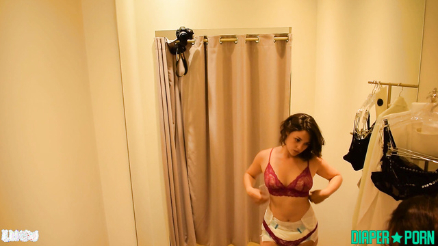 Topless brunette squirming in sexy underwear - FRDiapergirls
