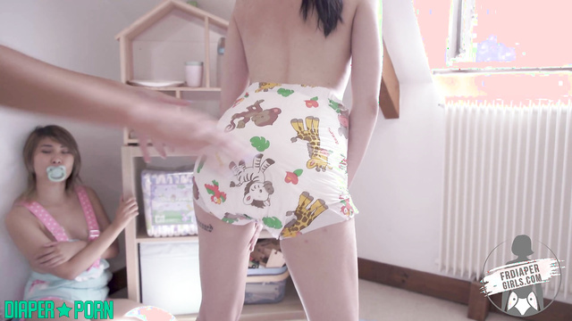 Topless Clara caught in diaper change by Charlotte - FRDiapergirls