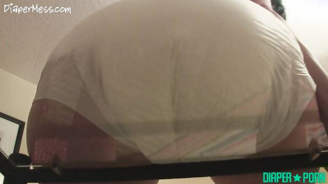Topless brunette shits, rubs dirty diaper all over - DiaperMess