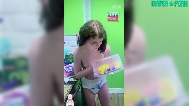 Topless brunette munching with pampers snug - LittleDiaperIdol