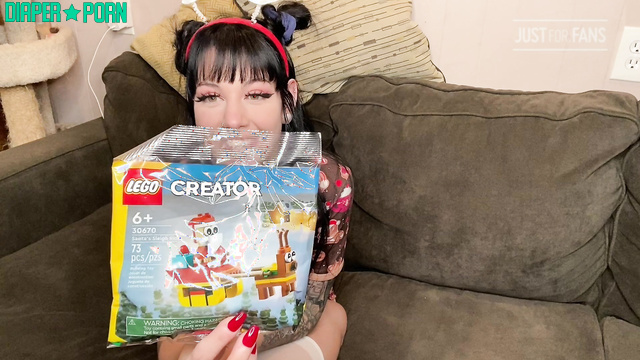 Tattooed brunette regresses in festive nappy - daddaslilstar