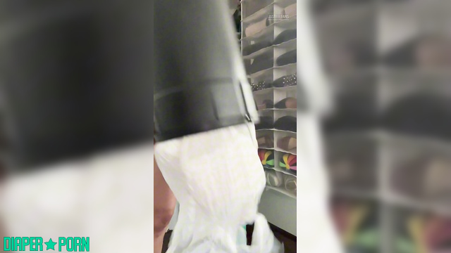 Brunette tease with bulky diaper doing chores - LolaAndThenSome