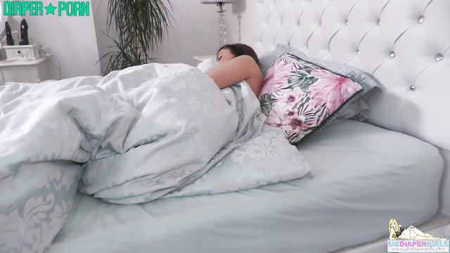 Tattooed brunette moaning in the shower with messy diaper - UKDiaperGirls