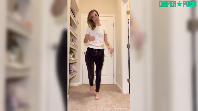 Brunette pissing through tight jeans with diaper leaking - Misspandapants