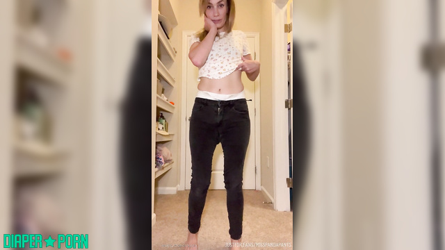 Brunette pissing through tight jeans with diaper leaking - Misspandapants