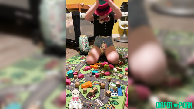 LittleDiaperIdol - Plays with legos and marbles on his mat