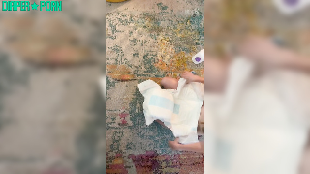 LolaAndThenSome - Before putting on a diaper, a lot of talc is used