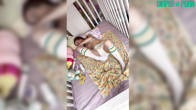 Brunette grinding toy while slipping on fresh diaper - Misspandapants