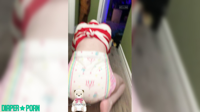 Brunette grinding in full diaper, teasing on knees - LittleDiaperIdol