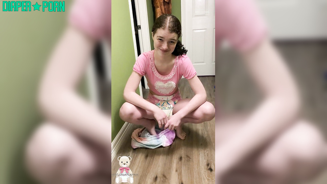 Fussy brunette squirms in full diaper - LittleDiaperIdol