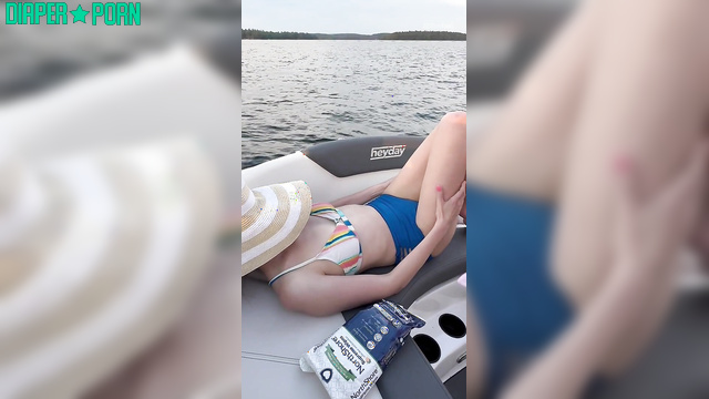 Tattooed brunette changes pampers on lake boat - LolaAndThenSome