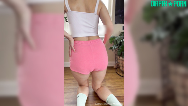 Brunette teasing with diaper peek, fingers pressing - Misspandapants