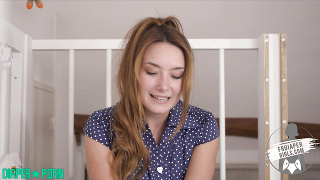 Redhead's solo tease with diaper snug - FRDiapergirls