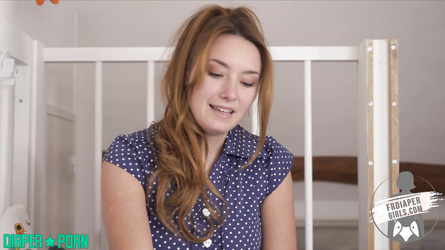 Redhead's solo tease with diaper snug - FRDiapergirls