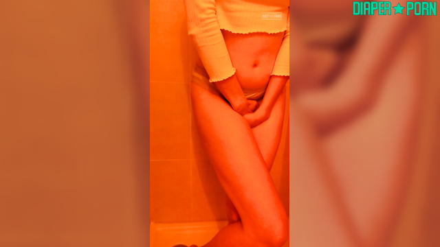 Brunette Stands Soaked and Messy in Quiet Embarrassment - DiaperRosie