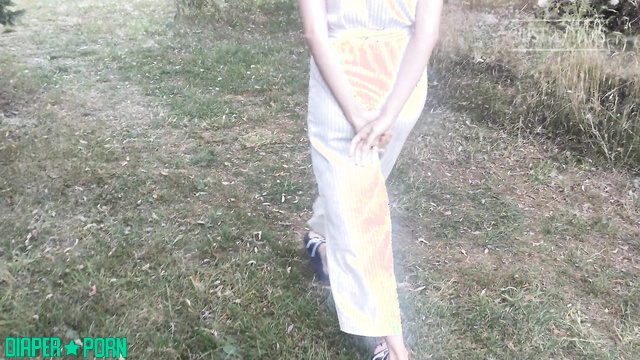 Wet panties pissing hard on quiet outdoor walk - DiaperRosie