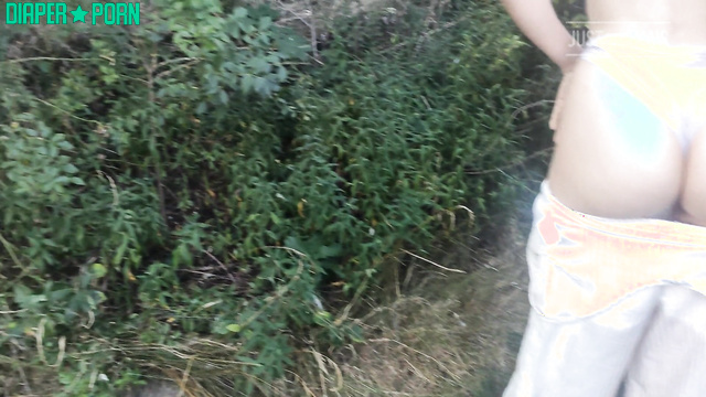 Wet panties pissing hard on quiet outdoor walk - DiaperRosie