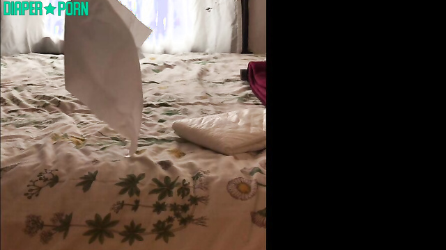 Brunette with big tits puts on pampers solo - bbabybbear