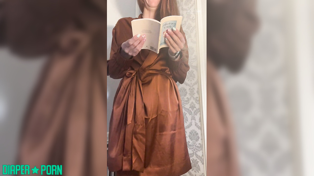 LolaAndThenSome - Topless girl quietly reading a book while wearing only a diaper