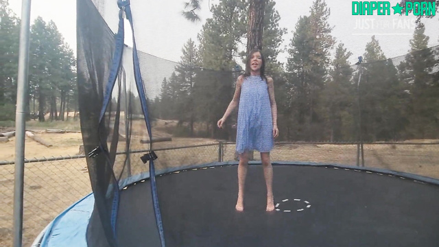 Brunette bouncing outdoors giggling as diaper crinkles - BabyFluffyBunny