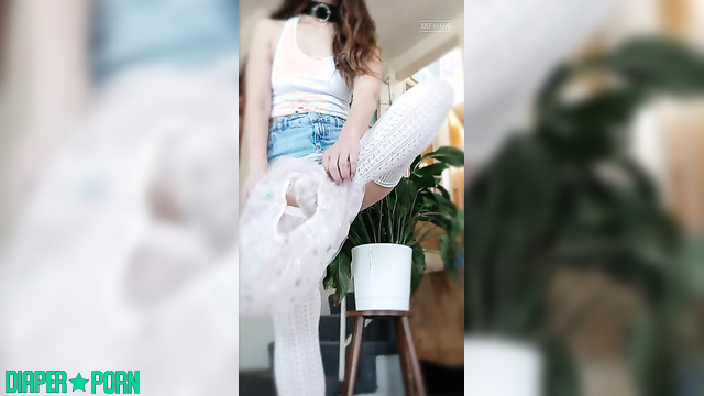 Long socks teasing while diaper sags - Wetbbybrat