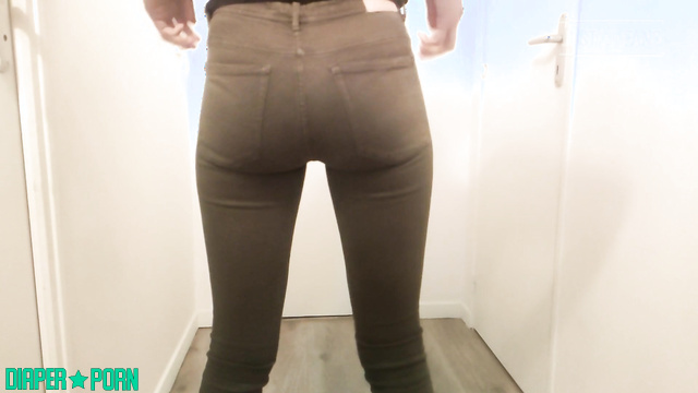 Brunette moaning as she wets tight jeans, loving the warmth - DiaperRosie