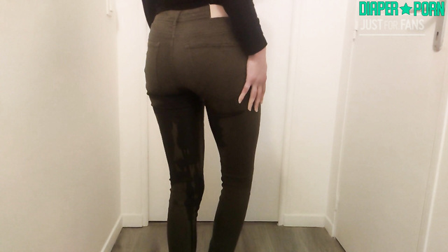 Brunette moaning as she wets tight jeans, loving the warmth - DiaperRosie