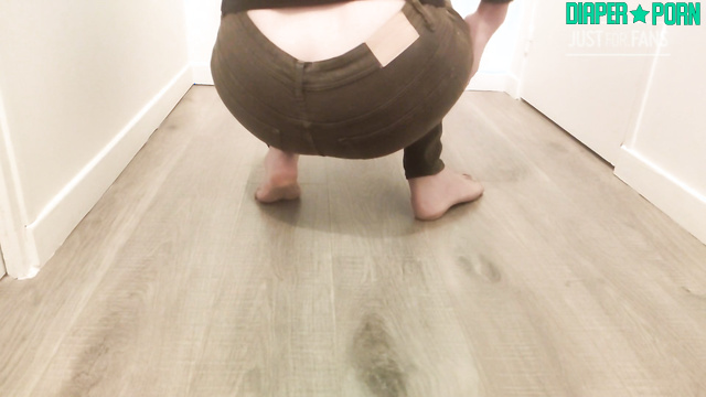 Brunette moaning as she wets tight jeans, loving the warmth - DiaperRosie