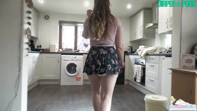 Brunette bending for chores, diaper peeking - UKDiaperGirls