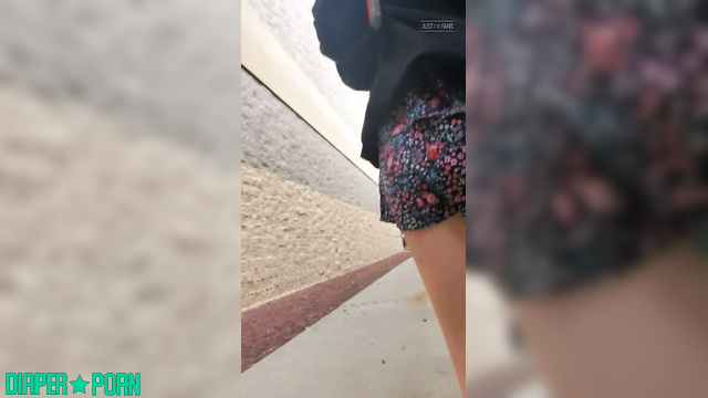 Brunette diaper peeking under dress while walking - BabyFluffyBunny
