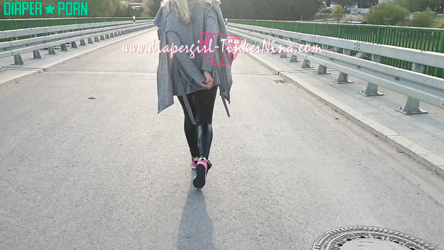 Blonde outdoors, pampers peeking under tight leggings - TinkerNina