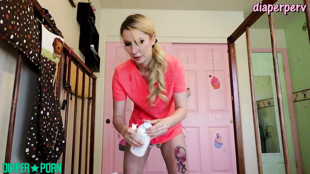 Naughty nurse Sydney Paige pissing hard in diaper - Ineedamommy