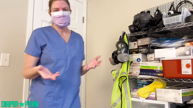 Gloved hands press while mask gags during diaper change - Sierra Loren