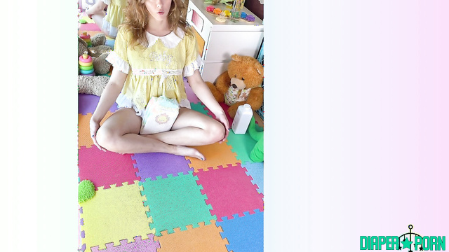 Redhead topless, squatting wide on soft mat - Bblinguini