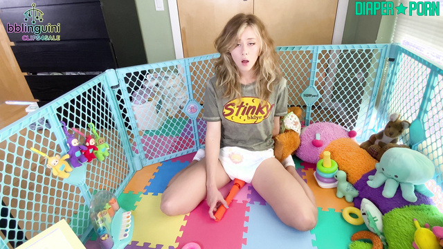Blonde moaning with sex toy on play mat - Bblinguini