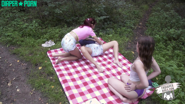 FRDiapergirls - Babes stroking pussies through diapers in the forest (Charlotte)